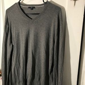 This is a grey v-neck “boyfriend” sweatshirt